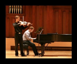 Chase Fickling plays the viola with pianist Michael Womack in Jones Concert Hall last spring. 