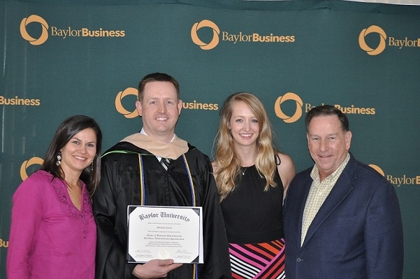 From left: Christina (Tina) Williams Clark '98 (BBA, Marketing); Matthew Cameron Clark, '00 (BBA, Accounting & Information Systems) and '15 (MBA in Healthcare Administration; Kathleen Susan Clark '08 (BSFCS),  and Dr. E.A. (Andy) Clark '72 (BS, Biology/Premed).