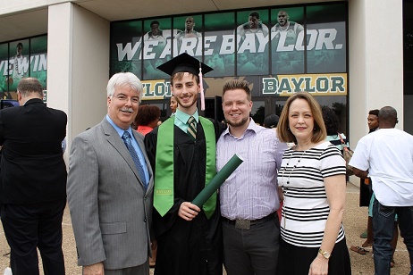 A Fickling Family Graduation: Dad Karl '80; 2015 grad Chase;   Brother Ryan '09; and Mom Dana '81.